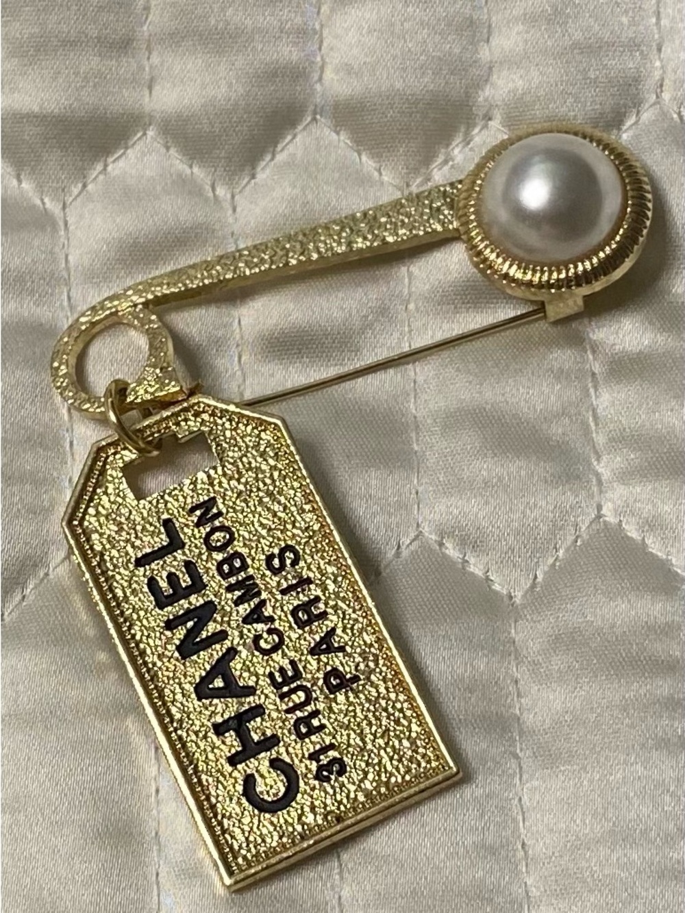 ChaneI. Gold- Tone with Black Lettering Tag/ Address Brooch Timeless